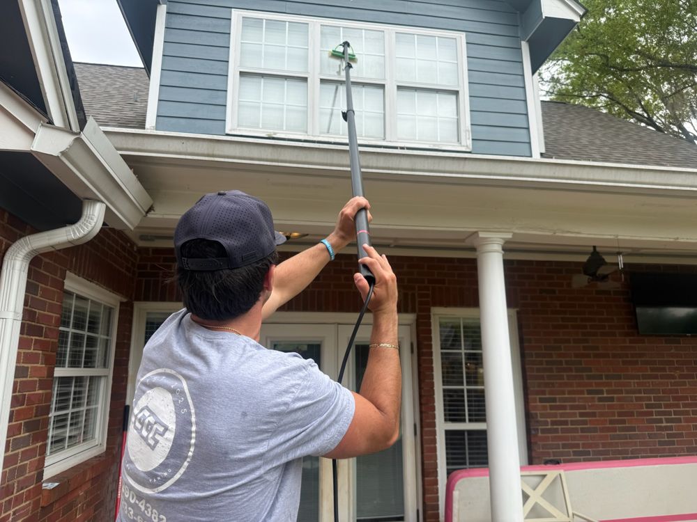 Capital City crew washing the second story of a Tallahassee home