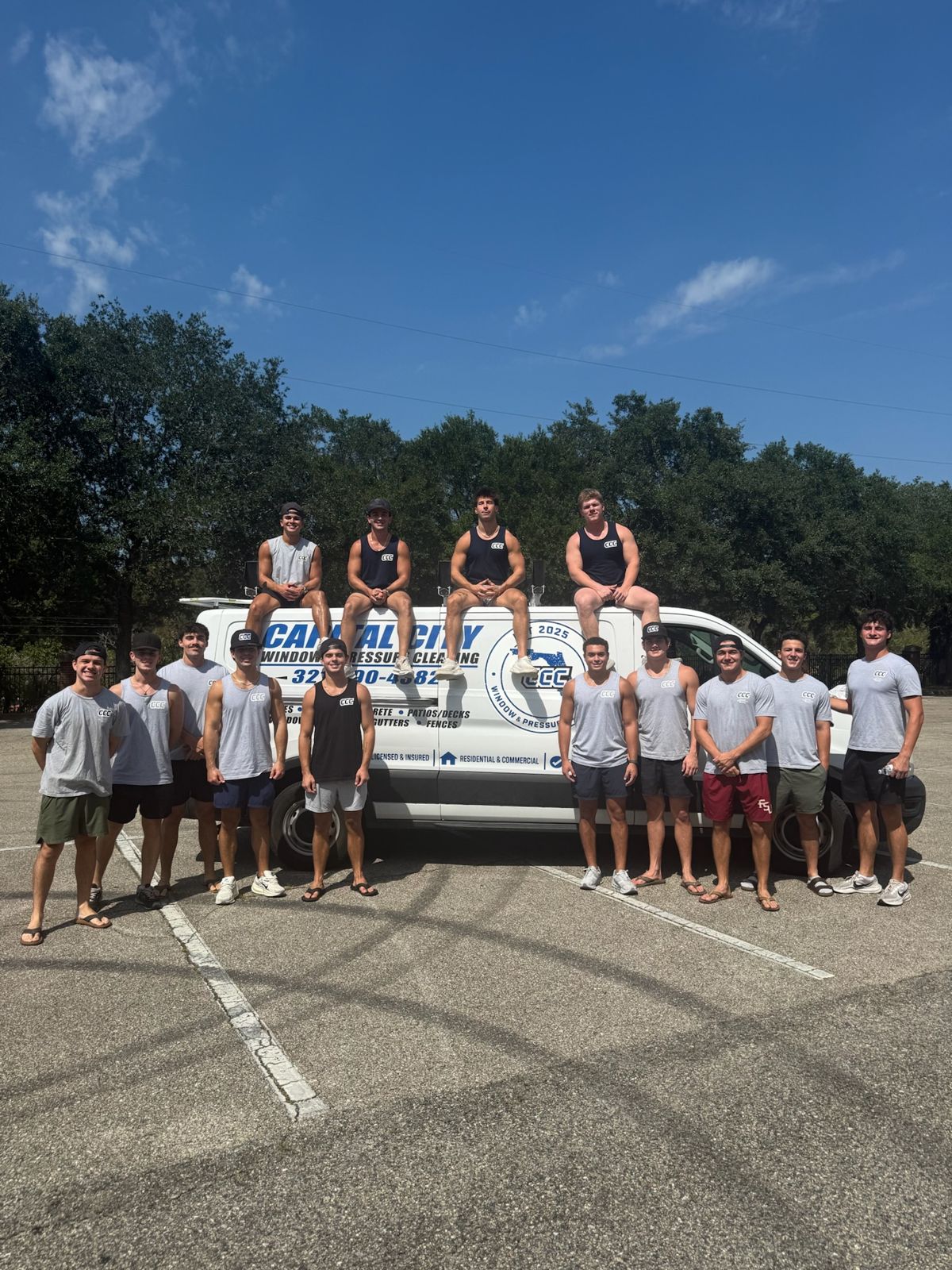The Capital City Window & Pressure Cleaning crew in front of their van